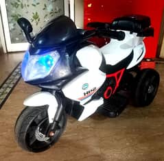 kids bike (Running condition) with dual motors,battery ok, 03218558387