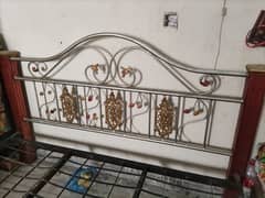 iron bed tiithth wooden foot