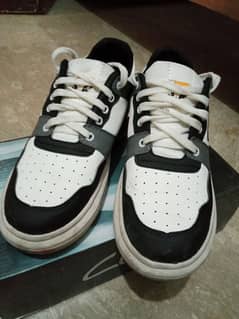 TWO PAIRS OF SNEAKERS