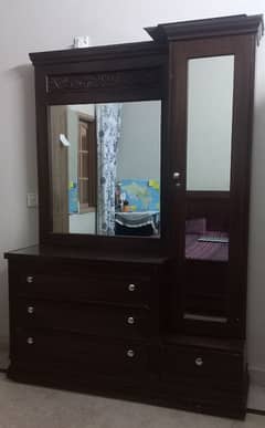 Dressing table with attached cupboard
