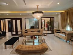 Designed with Elegance, Built for Peaceful Living,Brand New 2-Kanal Bungalow for Sale in DHA Phase 2 Fully Furnished Ground Floor and Semi-Furnished First Floor with 6 Bedrooms, 3 Kitchens, and a Lush Green Lawn