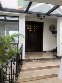 Luxury 5 Kanal Furnished Farmhouse for Sale in DHA Phase 9 Lahore with Private Pool