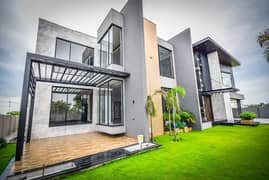 AC Installed 2 Kanal Slightly Used Modern Design House For Rent In DHA Phase 5 Lahore.
