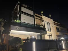 12.25 MARLA ULTRA LUXURY BRAND NEW MODERN CORNER HOUSE WITH AC INVERTERS AND 10 KV PLUS GREEN METER INSTALLED AVAILABLE IN THE HEART OF BAHRIA TOWN LAHORE , JASMINE BLOCK