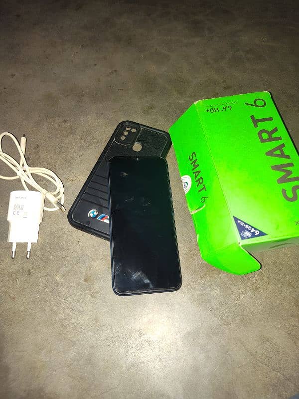 Infinix smart 6 box available with all accessories in good condition 0