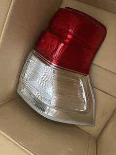 PRADO 2010 GENUINE HEADLIGHTS AND TAIL LIGHTS