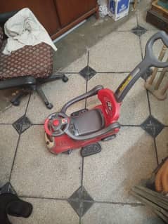 Red baby car with handle