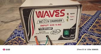 DC 12 volt charger for battery.