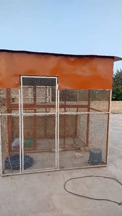 An iron made, large size cage for birds and pigeons.