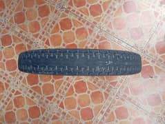 125 back tyre with tube in good condition
