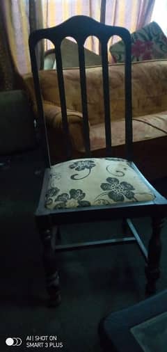 wooden dinning table with  5 seats.