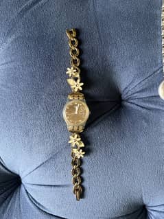 Swatch floral strap watch