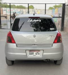 Suzuki Swift DLX 1.3 ABS 2013. Almost Genuine.