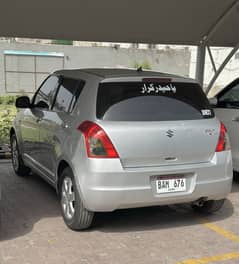 Suzuki Swift DLX 1.3 ABS 2013. Almost Genuine.