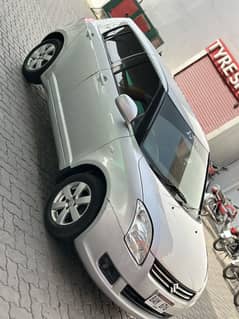Suzuki Swift DLX 1.3 ABS 2013. Almost Genuine.