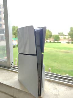 ps5 slim edition just 2 months used with 3 controllers