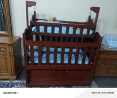 baby swing and baby cot