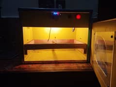 almost new 56 eggs semi automatic eggs incubator