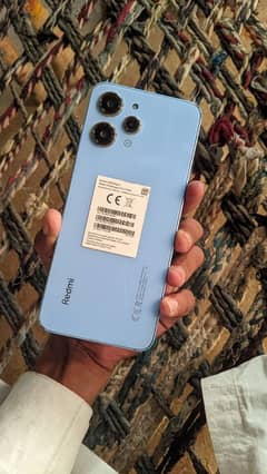 Redmi 12 _8-128 box charger sath exchange possible