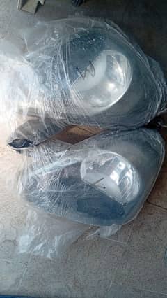 daihatsu Mira headlights