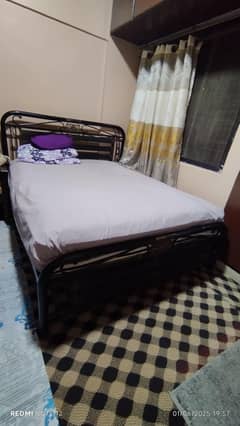 Bed with spring mattress