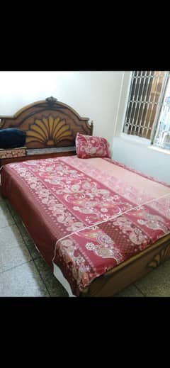 Wooden bed with spring mattress for sale