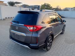 Honda br v s push full option model 2021 grey color done 27000 km