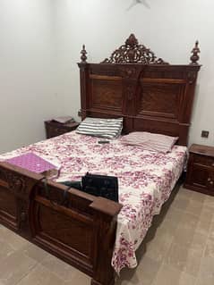 double bed with dressing table and side table
