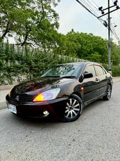 Mitsubishi Lancer 2006 automatic own engine better Honda city civic