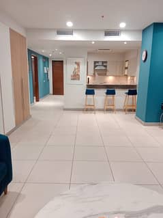Luxurious One and half bedroom Brand New Semi Furnished Apartment Is Available For Rent Building A Facing Park Corners.