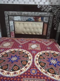 bed. side tables. iron stand. cupboard Almari