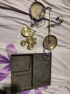 vintage gold weighing scale.
