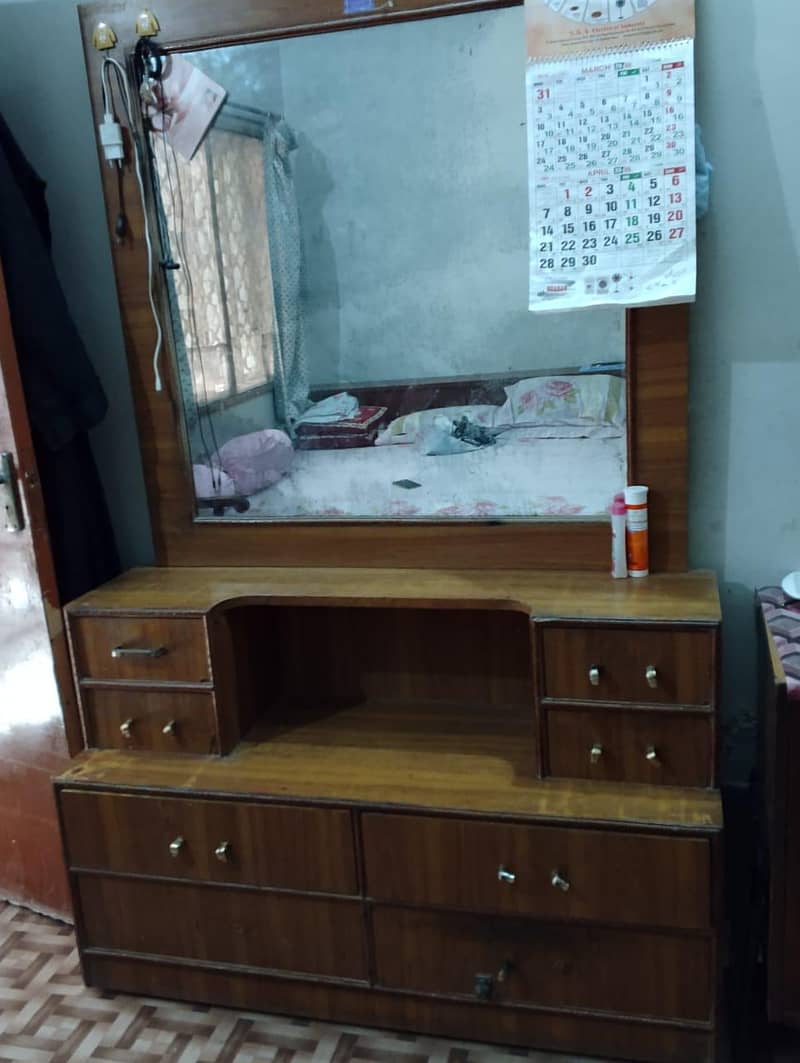 bed without metress  and one dressing table 1