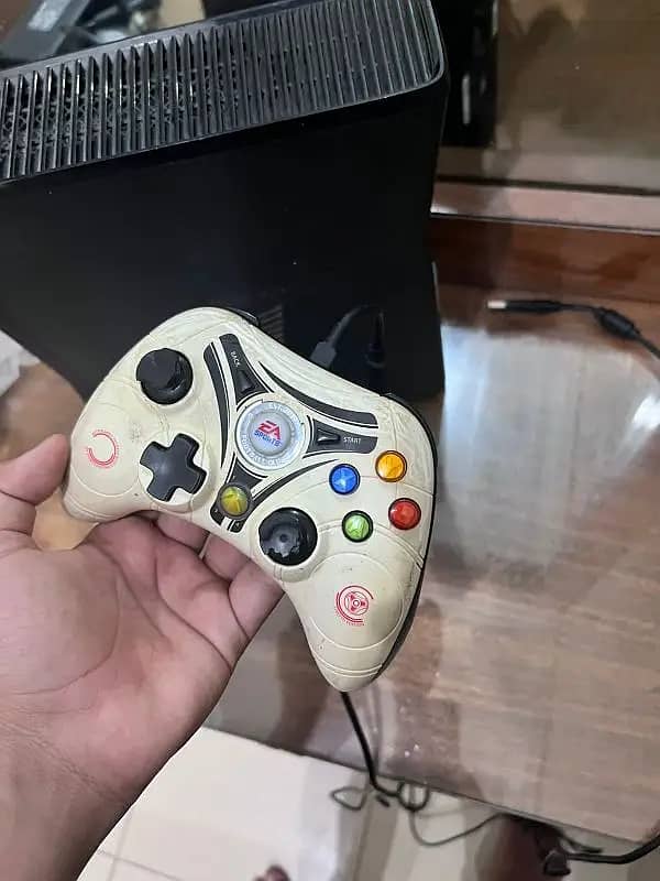 xbox 360 slim barely used with a special edition controller of EA 2