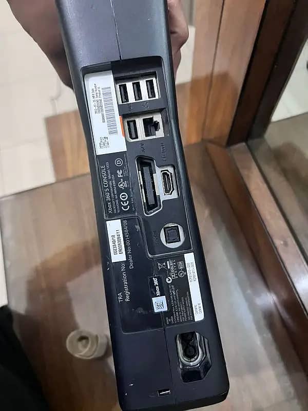 xbox 360 slim barely used with a special edition controller of EA 4