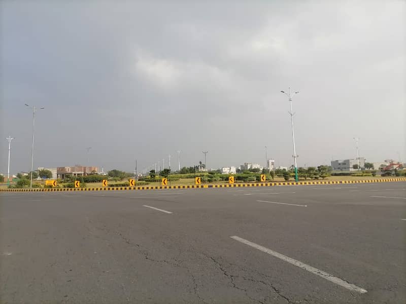 "Claim Your Corner of Bliss: Plot No. 449 on 70 Feet Road, Block W in DHA Phase 8" 0