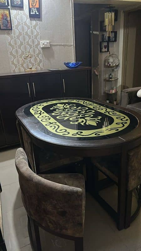 dininng tables and one side table 0