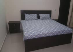 Bed with side tables