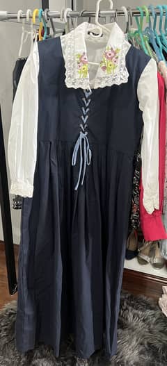 Laced dress with floral undershirt