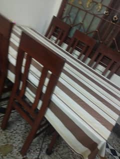 dinning table for sale with 6 wooden chinyouti chairs