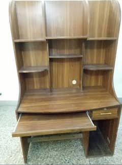 computer table with decorations storage