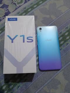 Selling vivo Y1s with box and original charger excellent condition