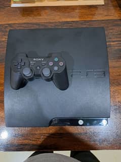 Ps3 console with original controller and wires plus 3 games included