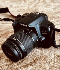 Canon 1300D with 18-55mm lens