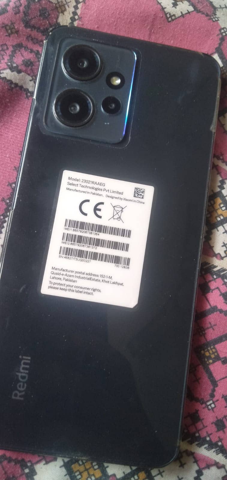 Redmi note 12. Only screen's cracked, else it is working and original. 3