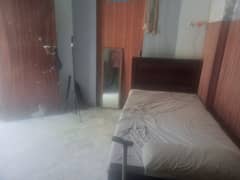 Full furnished bedroom ideal for bachelors in model town F block for rent