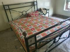 IRON bed with two side tables
