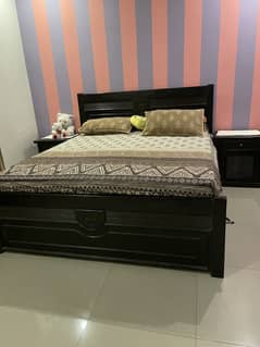 Wooden bed on sale