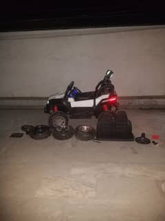 Electric car with Bluetooth mode and 4 lights. extra three tier and a r