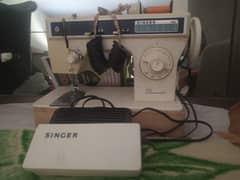 singer sewing machine genuine